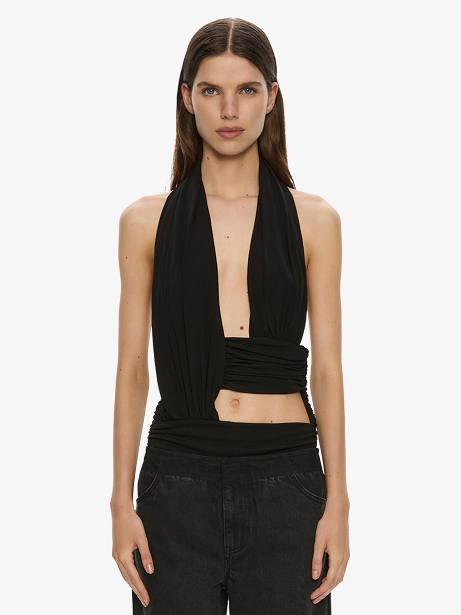 Image of a model wearing Tops. Product name - Draped Cummerbund Jersey Top in Black colour by brand - CHRISTOPHER ESBER
