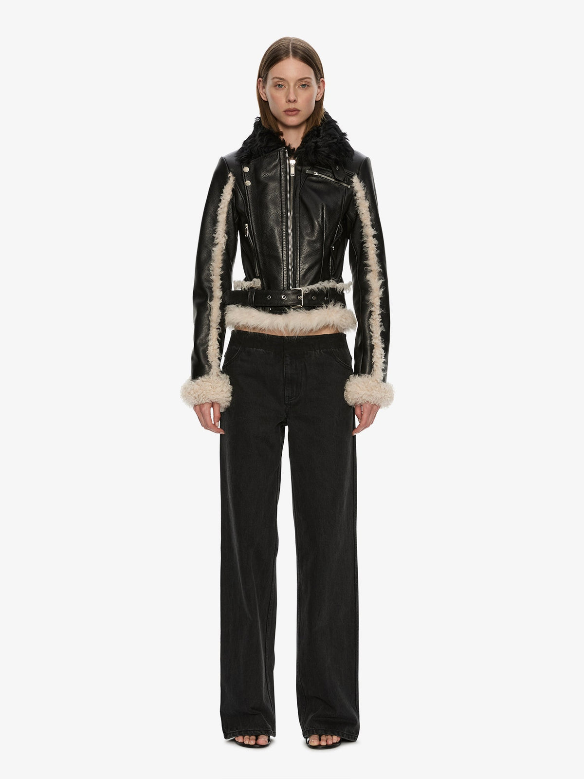 Image of a model wearing Outerwear. Product name - Tyler Shearling Biker Jacket in Cream colour by brand - CHRISTOPHER ESBER