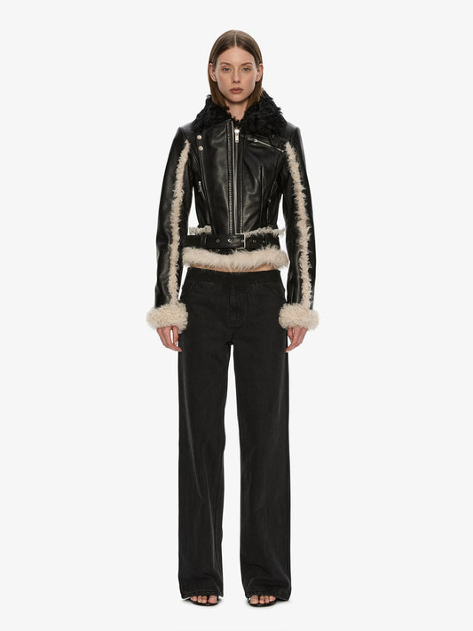 Image of a model wearing Outerwear. Product name - Tyler Shearling Biker Jacket in Cream colour by brand - CHRISTOPHER ESBER