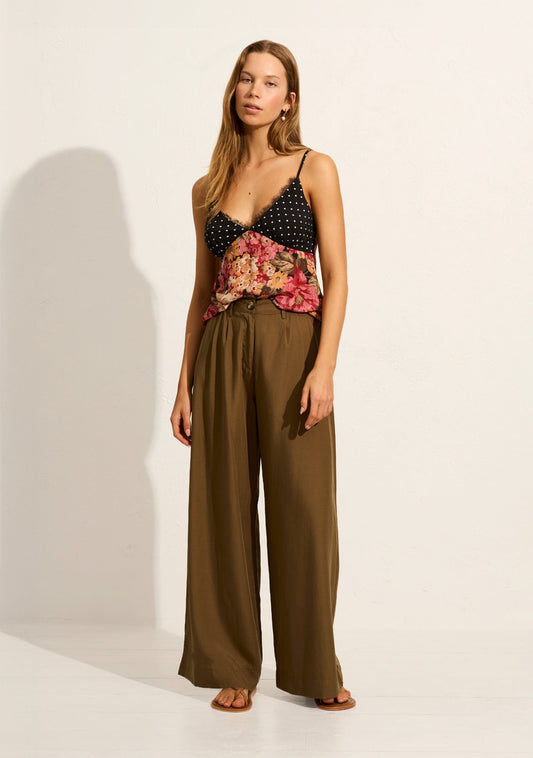 Image of a model wearing Pants. Productname: Auguste The Label Spencer Pant in Green colour by brand - Auguste The Label