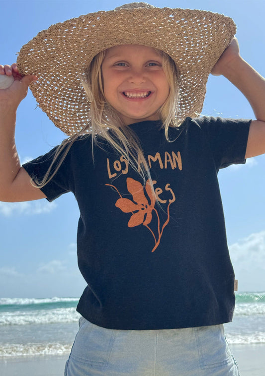 Image of a model wearing Tops. Productname: LITTLE AUGUSTE Spanish Lovers Classic Tee in Print colour by brand - LITTLE AUGUSTE