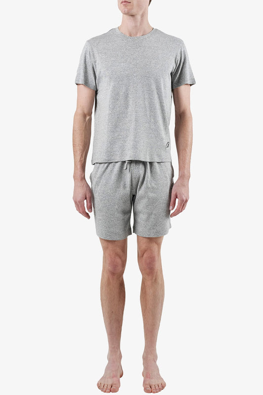 Image of a model wearing Shorts. Productname: Rise Grey Sleep Shorts in Grey colour by brand - Anthony Squires