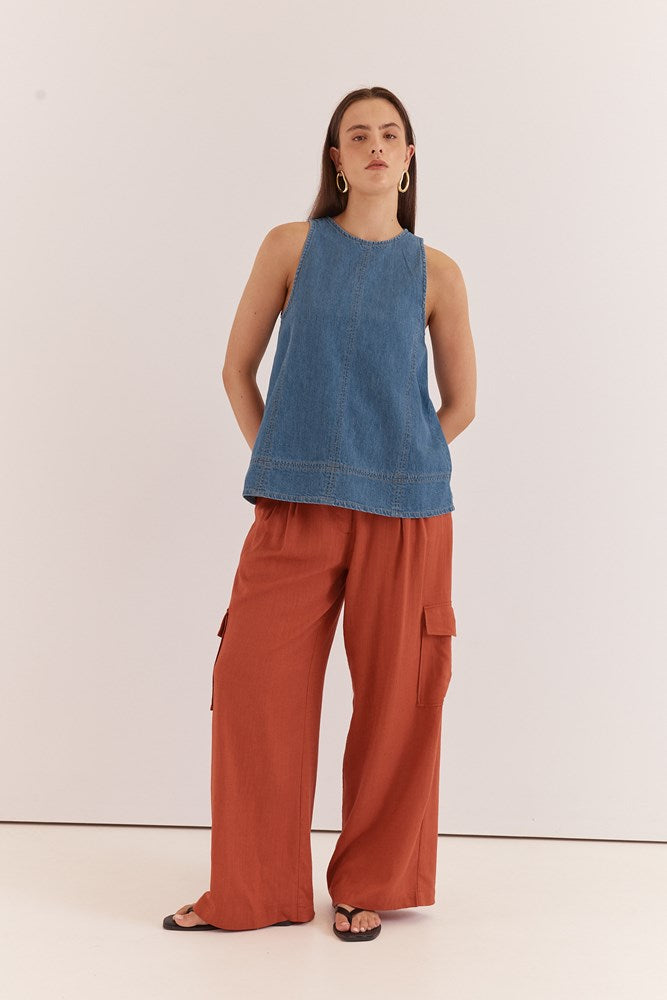 Image of a model wearing Pants. Product name - Katia Cargo Trouser in Rust Red colour by brand - Sass Clothing
