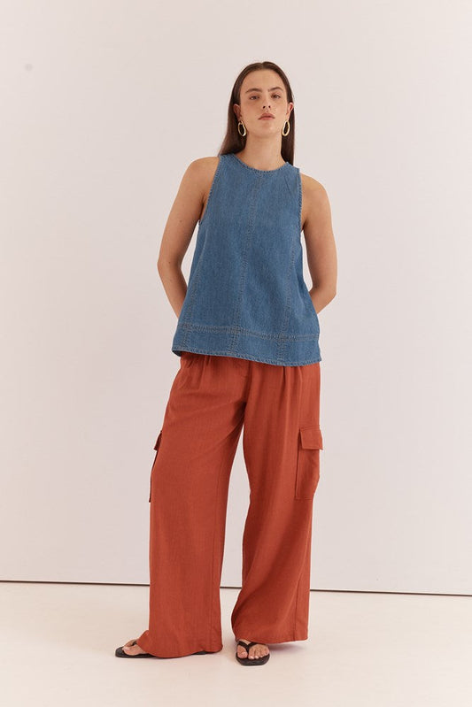 Image of a model wearing Pants. Product name - Katia Cargo Trouser in Rust Red colour by brand - Sass Clothing