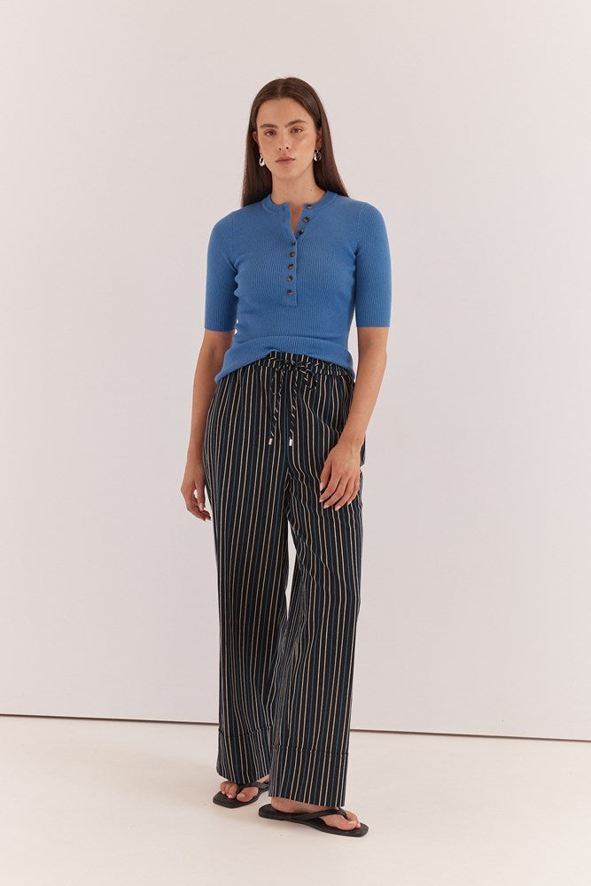 Image of a model wearing Pants. Product name - Sol Resort Pants in Black Cobalt Stripe colour by brand - Sass Clothing