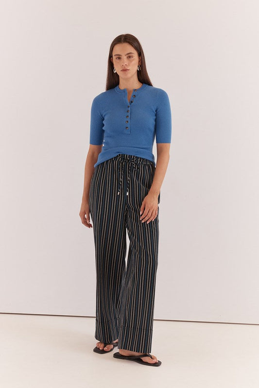 Image of a model wearing Pants. Product name - Sol Resort Pants in Black Cobalt Stripe colour by brand - Sass Clothing