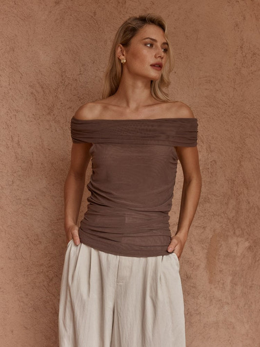 Image of a model wearing Tops. Product name - Jordan Off Shoulder Top Chocolate in Chocolate colour by brand - Sass Clothing