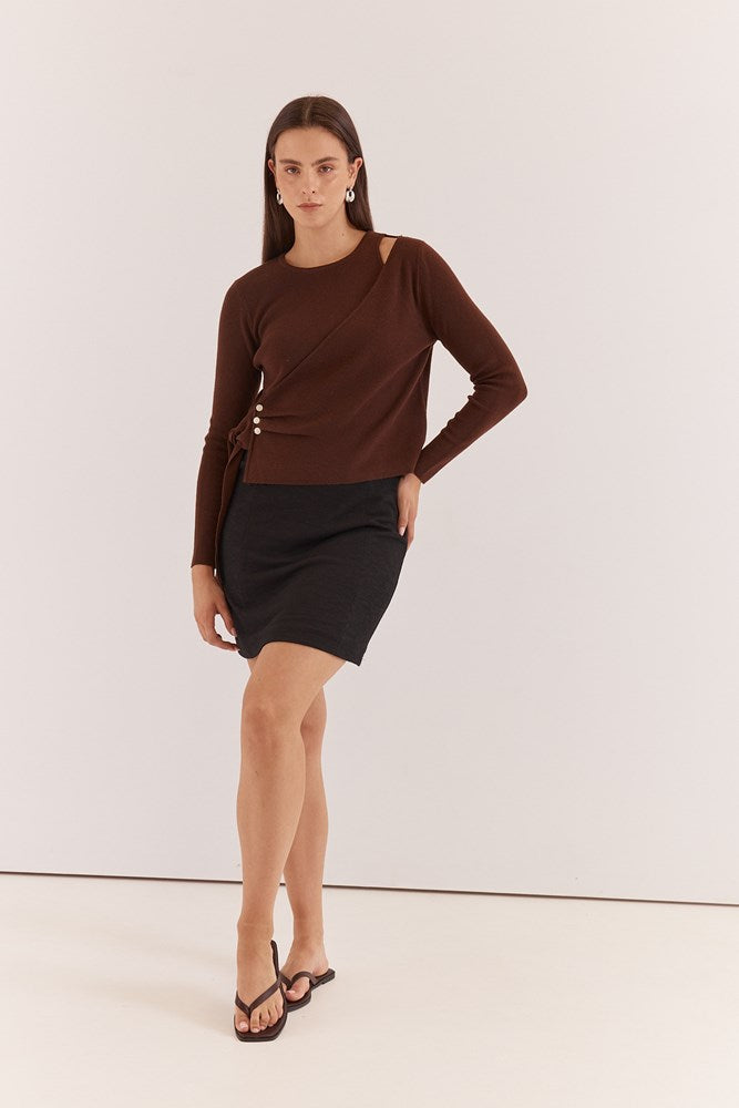 Image of a model wearing Outerwear. Product name - Azalea Wrap Sweater Chocolate in Chocolate colour by brand - Sass Clothing