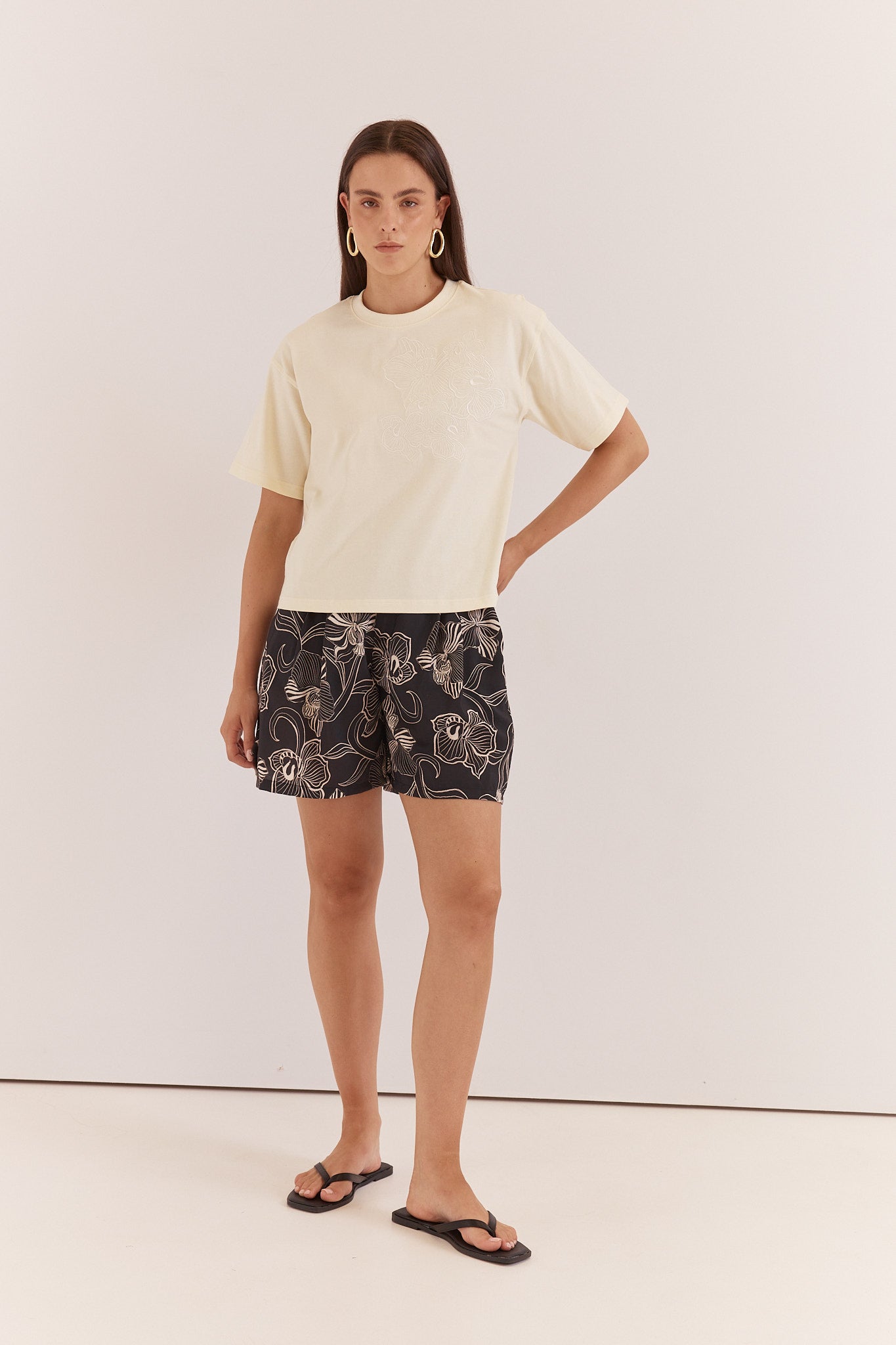 Image of a model wearing Shorts. Product name - Maia Tailored Short in Snap Dragon colour by brand - Sass Clothing