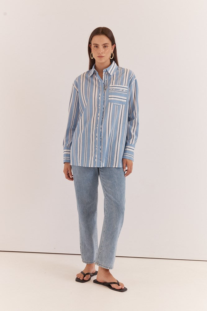Image of a model wearing Tops. Product name - Nyx Piped Stripe Shirt in Blue Stripe colour by brand - Sass Clothing