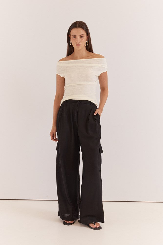 Image of a model wearing Tops. Product name - Talia Jersey Top in Cream colour by brand - Sass Clothing