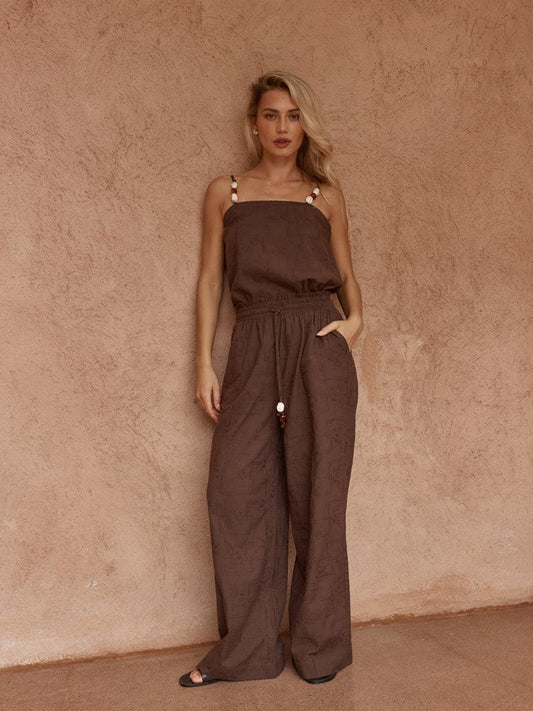 Image of a model wearing Pants. Product name - Bellie Embroidered Pant Chocolate in Chocolate colour by brand - Sass Clothing