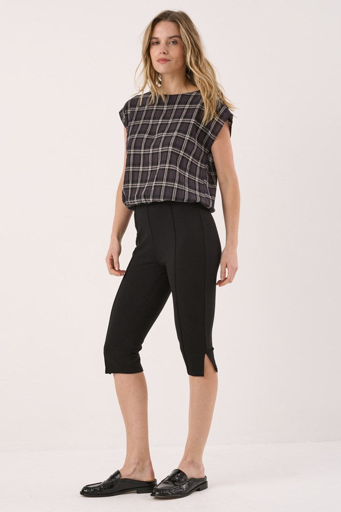 Image of a model wearing Pants. Product name - Alex Ponte Capri Black in Black colour by brand - Sass Clothing