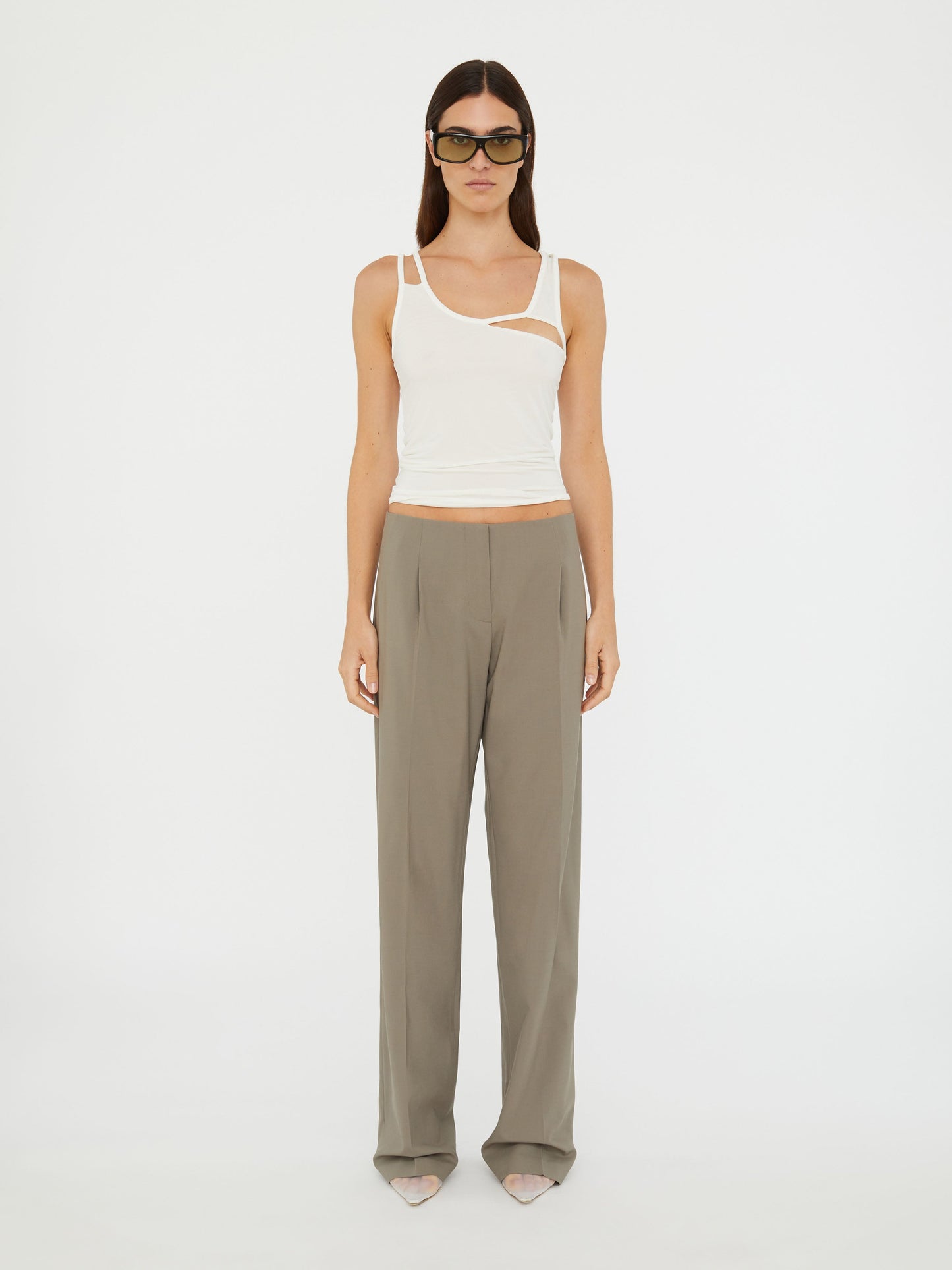 Image of a model wearing Pants. Productname: Christopher Esber Redux Wool Trouser in Eucalypt colour by brand - Christopher Esber