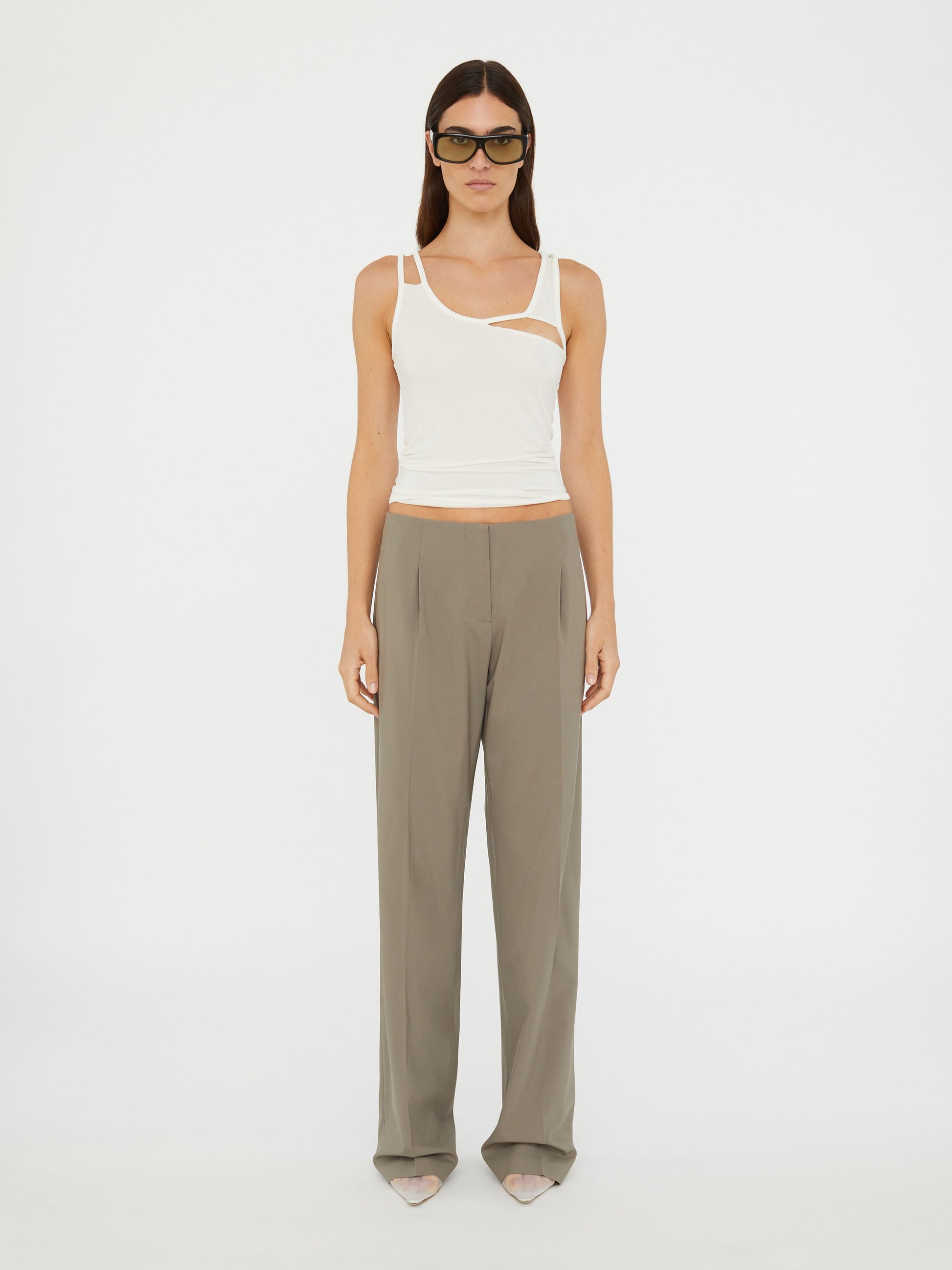 Image of a model wearing Pants. Productname: Christopher Esber Redux Wool Trouser in Eucalypt colour by brand - Christopher Esber