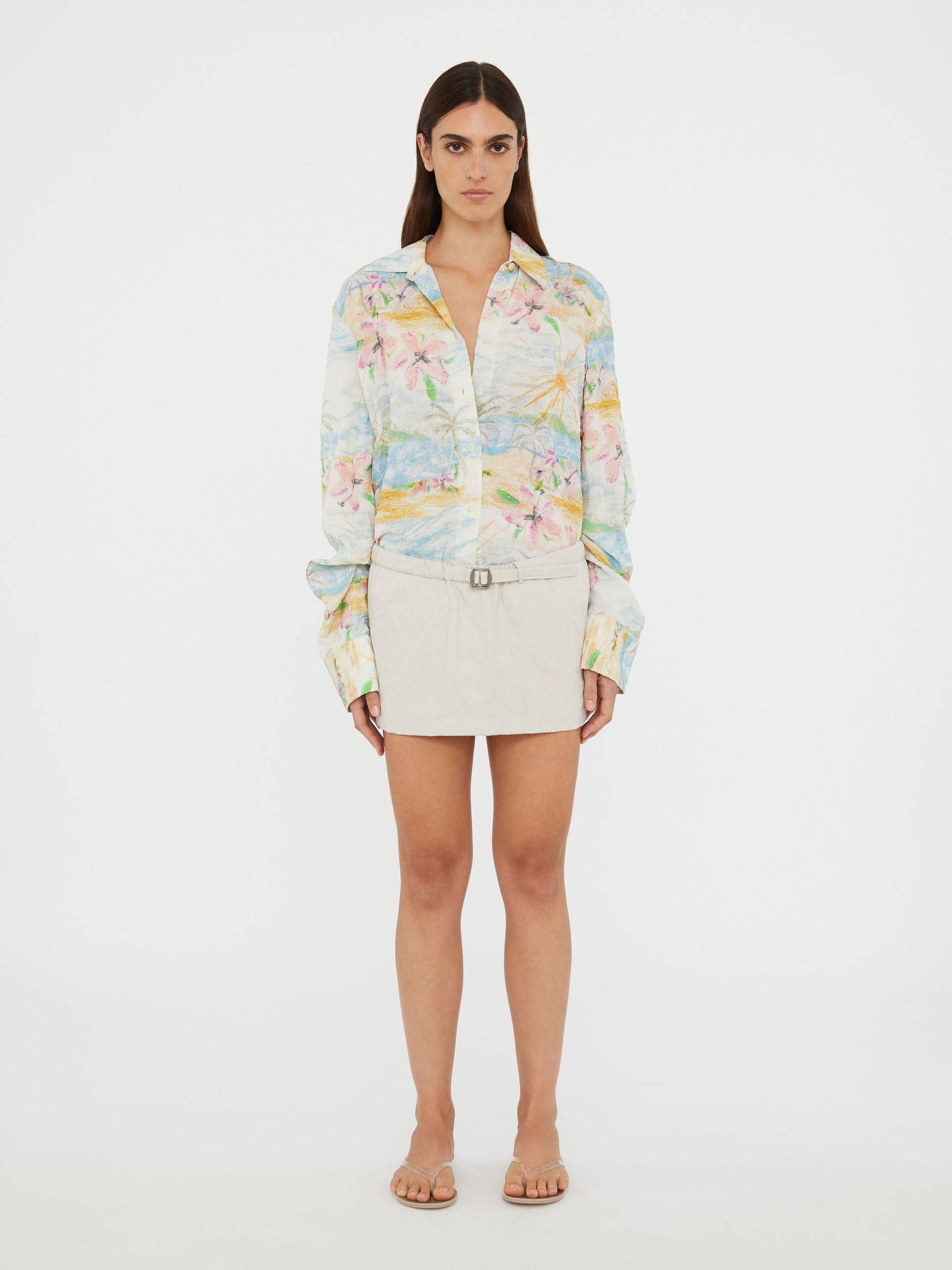 Image of a model wearing Skirts. Productname: Christopher Esber Crushed Belted Mini Skirt in Cloud colour by brand - Christopher Esber