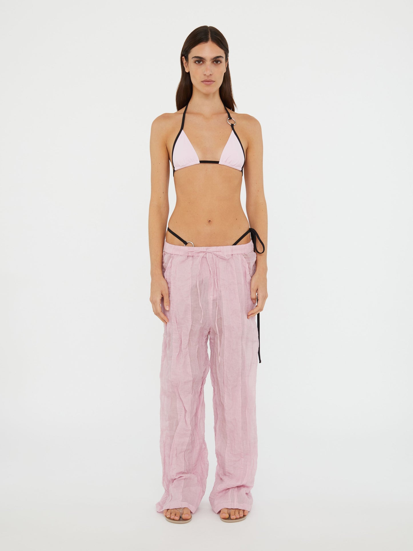 Image of a model wearing Pants. Productname: Christopher Esber Crushed Multi Panelled Pant in Pant colour by brand - Christopher Esber