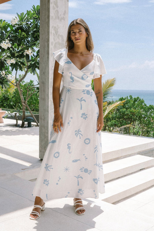 Image of Dresses. Product name - Marini White Blue Tropical Multiway Maxi Dress in Tropical colour by brand - HEYCHIC