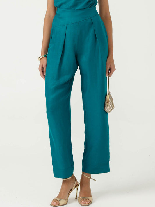 Image of a model wearing Pants. Product name - Sacha Drake Corfu Pant in Peacock colour by brand - Sacha Drake