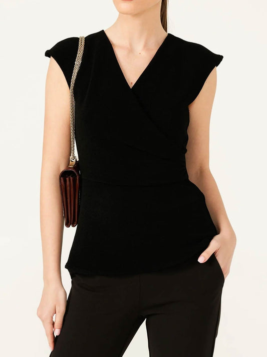 Image of a model wearing Tops. Productname: Sacha Drake Faux Wrap Peplum Top in Black colour by brand - Sacha Drake