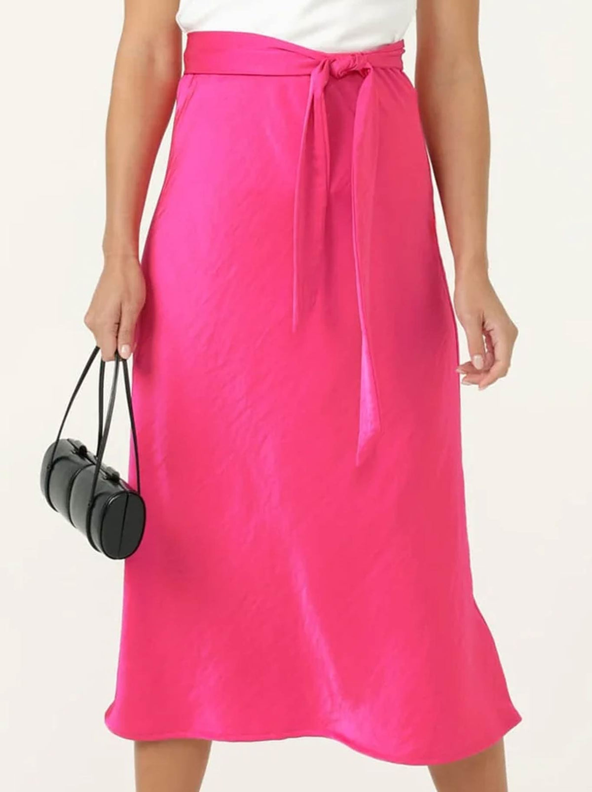 Image of a model wearing Skirts. Product name - Sacha Drake Luxe Bias Skirt in Pink colour by brand - Sacha Drake