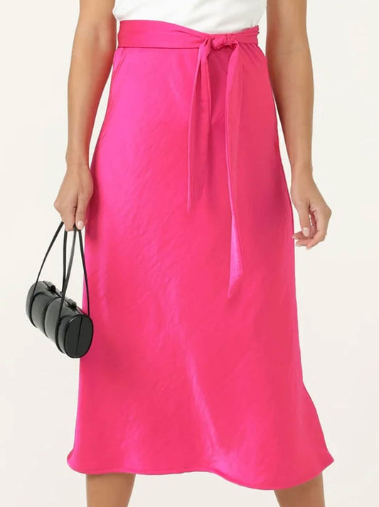 Image of a model wearing Skirts. Product name - Sacha Drake Luxe Bias Skirt in Pink colour by brand - Sacha Drake