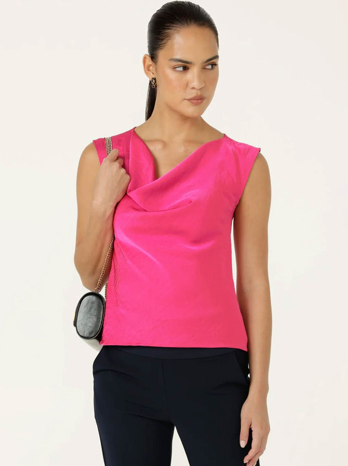 Image of a model wearing Tops. Product name - Sacha Drake Luxe Cowl Bias Top in Pink colour by brand - Sacha Drake