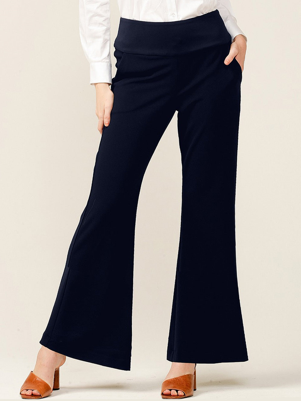Image of a model wearing Pants. Productname: Sacha Drake Classic Trouser in Navy colour by brand - Sacha Drake Pty Ltd