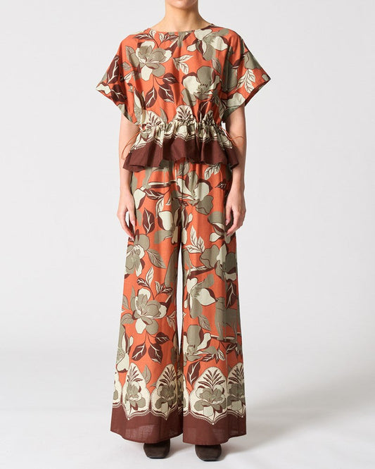 Image of a model wearing Tops. Productname: Santiago Top in Jaguar Jungle Orange colour by brand - Walnut Melbourne