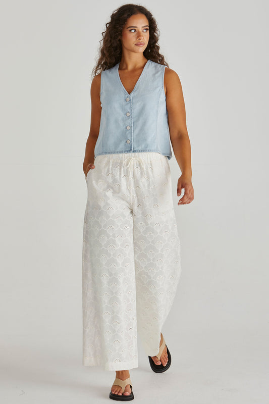Image of a model wearing Pants. Product name - Zimmy Broderie Pant Cream in Cream colour by brand - Sass Clothing