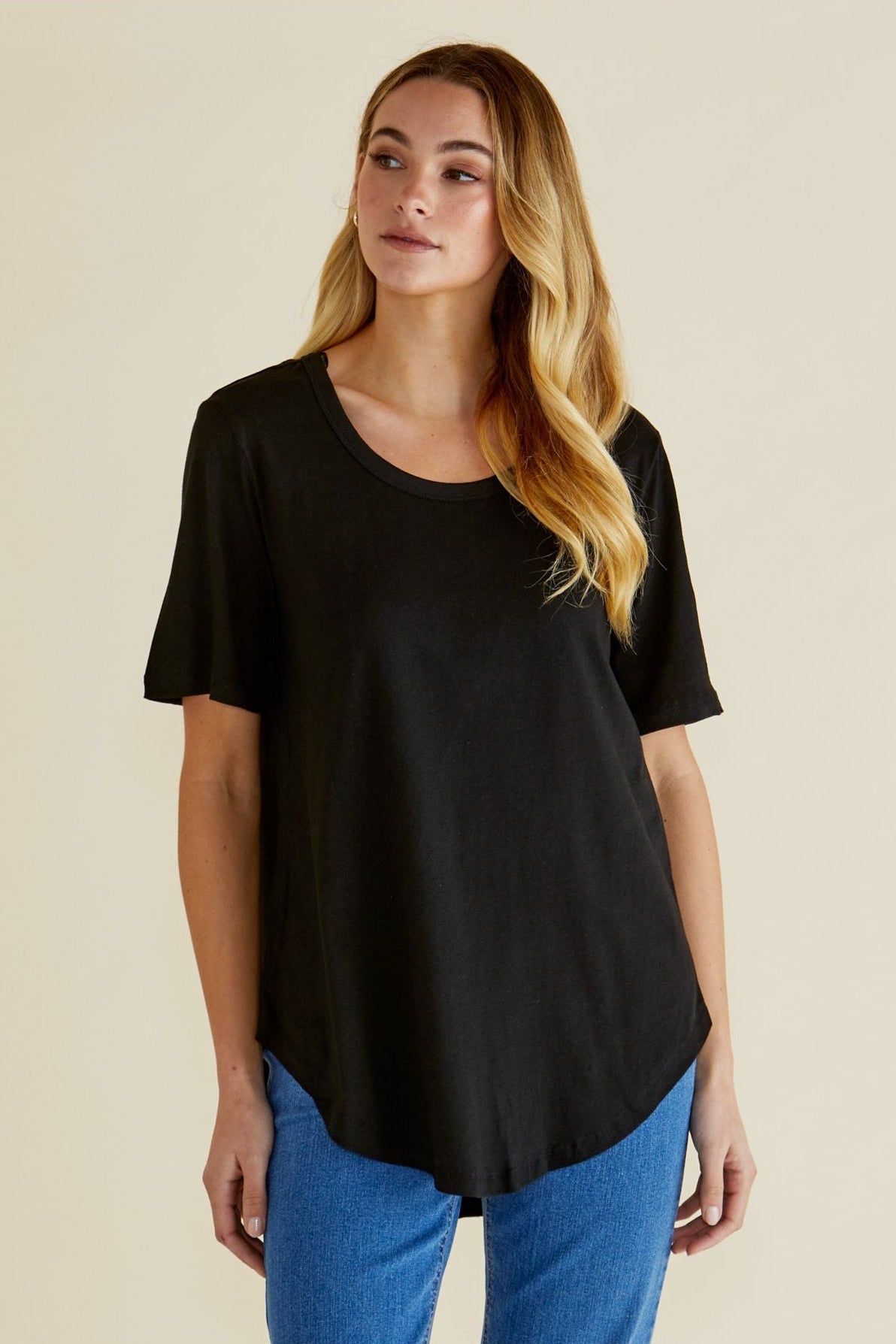 Image of a model wearing Tops. Productname: Betty Basics Ariana Tee Black in Black colour by brand - Betty Basics