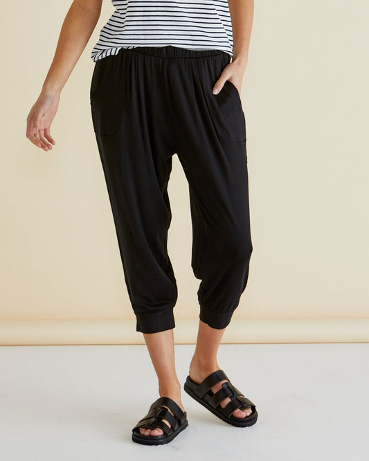 Image of a model wearing Pants. Productname: Betty Basics Tokyo 3/4 Pant Black in Black colour by brand - Betty Basics