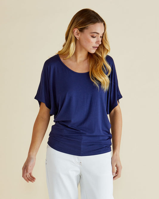 Image of a model wearing Tops. Productname: Betty Basics Maui Tee Navy in Navy colour by brand - Betty Basics