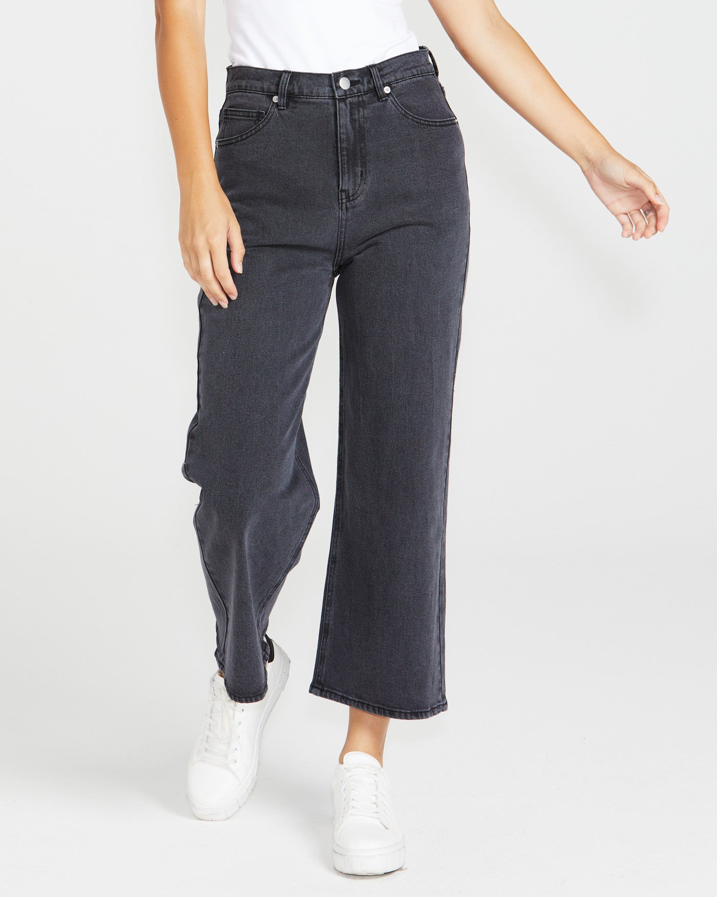 Image of a model wearing Pants. Product name - Sandy Jean 82 Washed Black in 82 Washed Black colour by brand - Sass Clothing