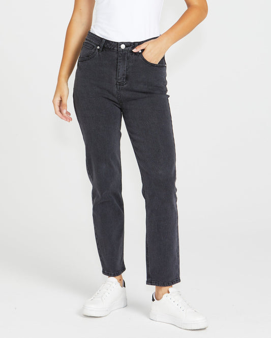 Image of a model wearing Pants. Product name - Nat Jean 82 Washed Black in 82 Washed Black colour by brand - Sass Clothing