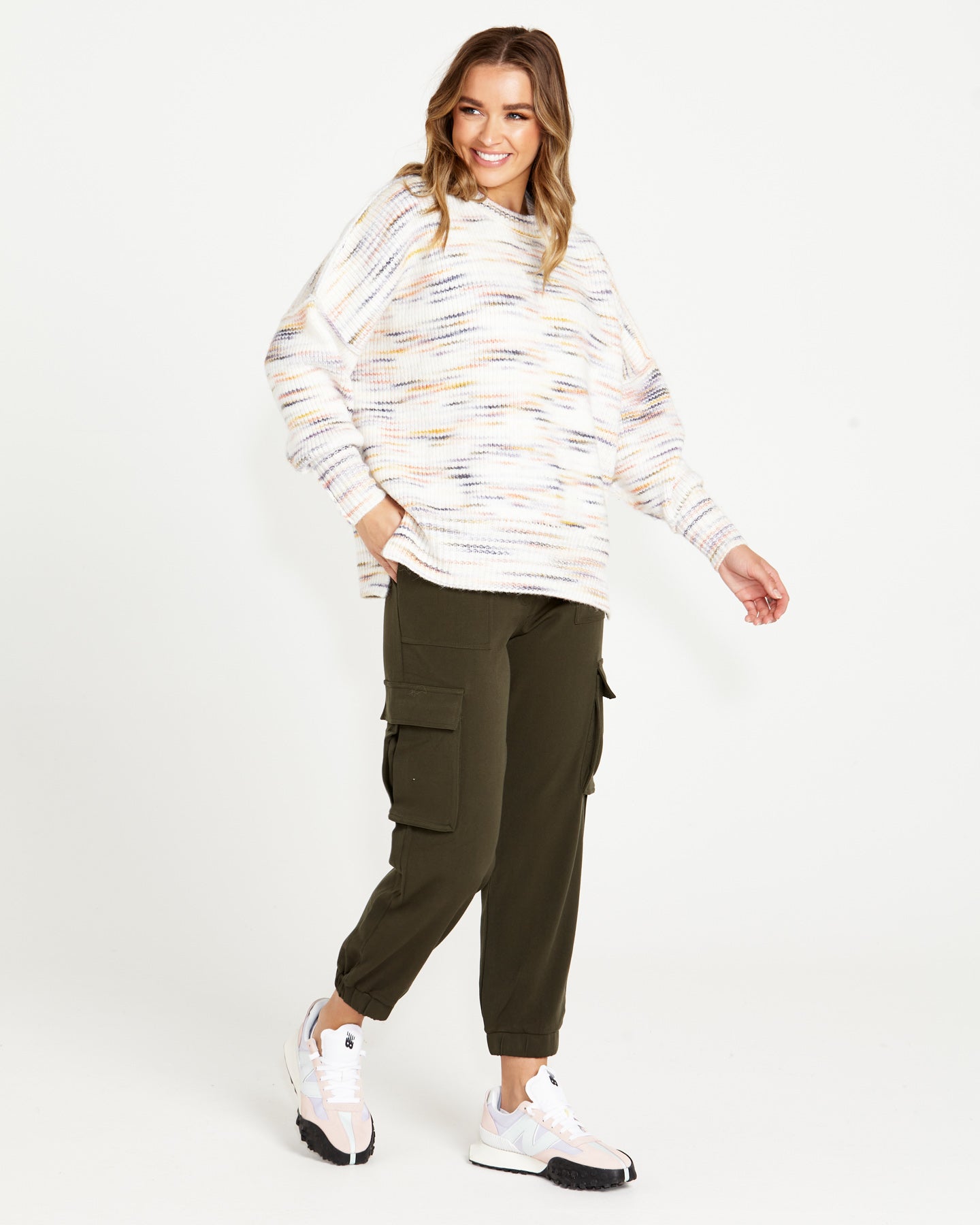 Image of a model wearing Tops. Product name - Pepper Space Oversized Wool-Blend Jumper Cream Rainbow Marle in Rainbow Marle colour by brand - Sass Clothing