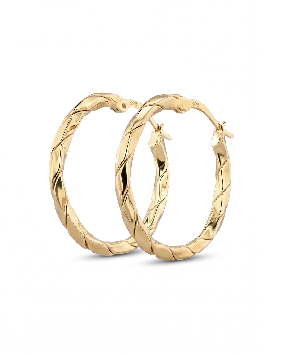 Image of Earrings. Product name - Sculptural Gold Hoop Earrings in colour by brand - LAVANA