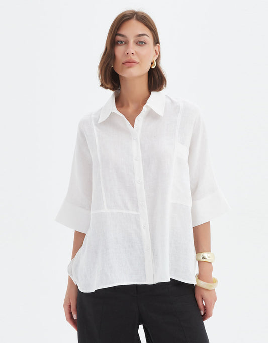 Image of a model wearing Tops. Productname: Seam Detail Boxy Shirt - in White colour by brand - Tirelli