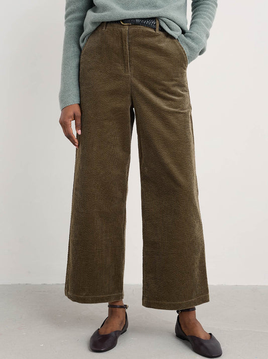 Image of a model wearing Pants. Product name - Seasalt Asphodel Trouser in Seagrass colour by brand - Seasalt