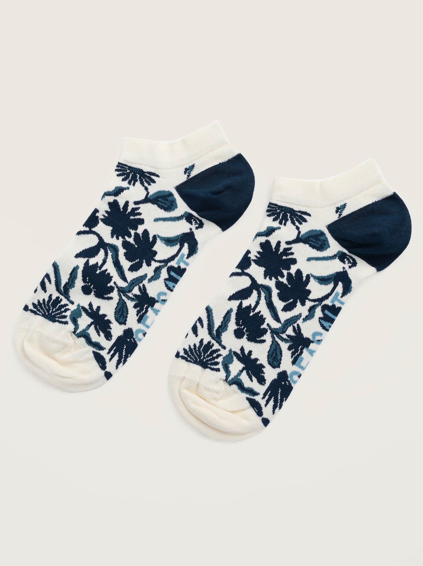 Image of Socks. Product name - Seasalt Bamboo Arty Trainer Socks in Inked Flowers Ocean colour by brand - Seasalt
