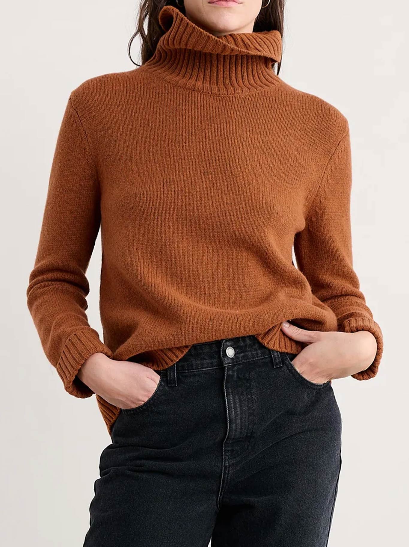 Image of a model wearing Outerwear. Product name - Seasalt Braque Jumper in Rusted colour by brand - Seasalt