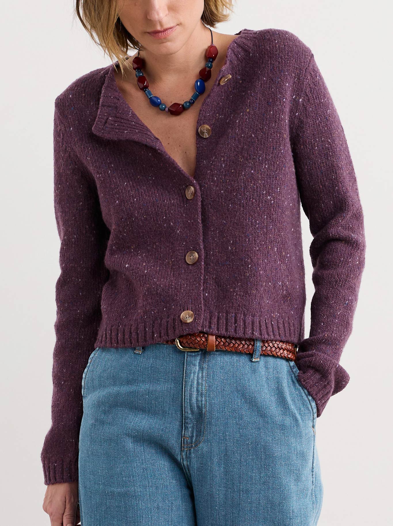 Image of a model wearing Outerwear. Product name - Seasalt Dawson Pick Cardigan in Grape colour by brand - Seasalt