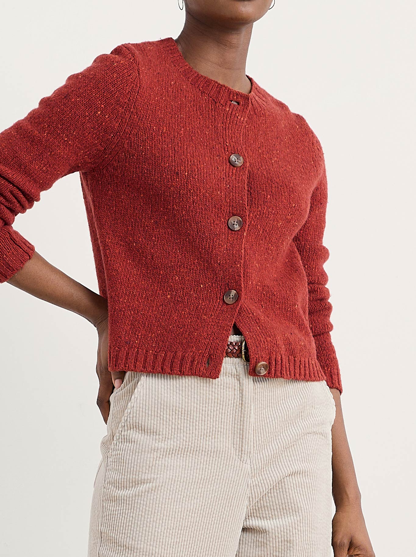 Image of a model wearing Outerwear. Product name - Seasalt Dawson Pick Cardigan in Red Sail colour by brand - Seasalt