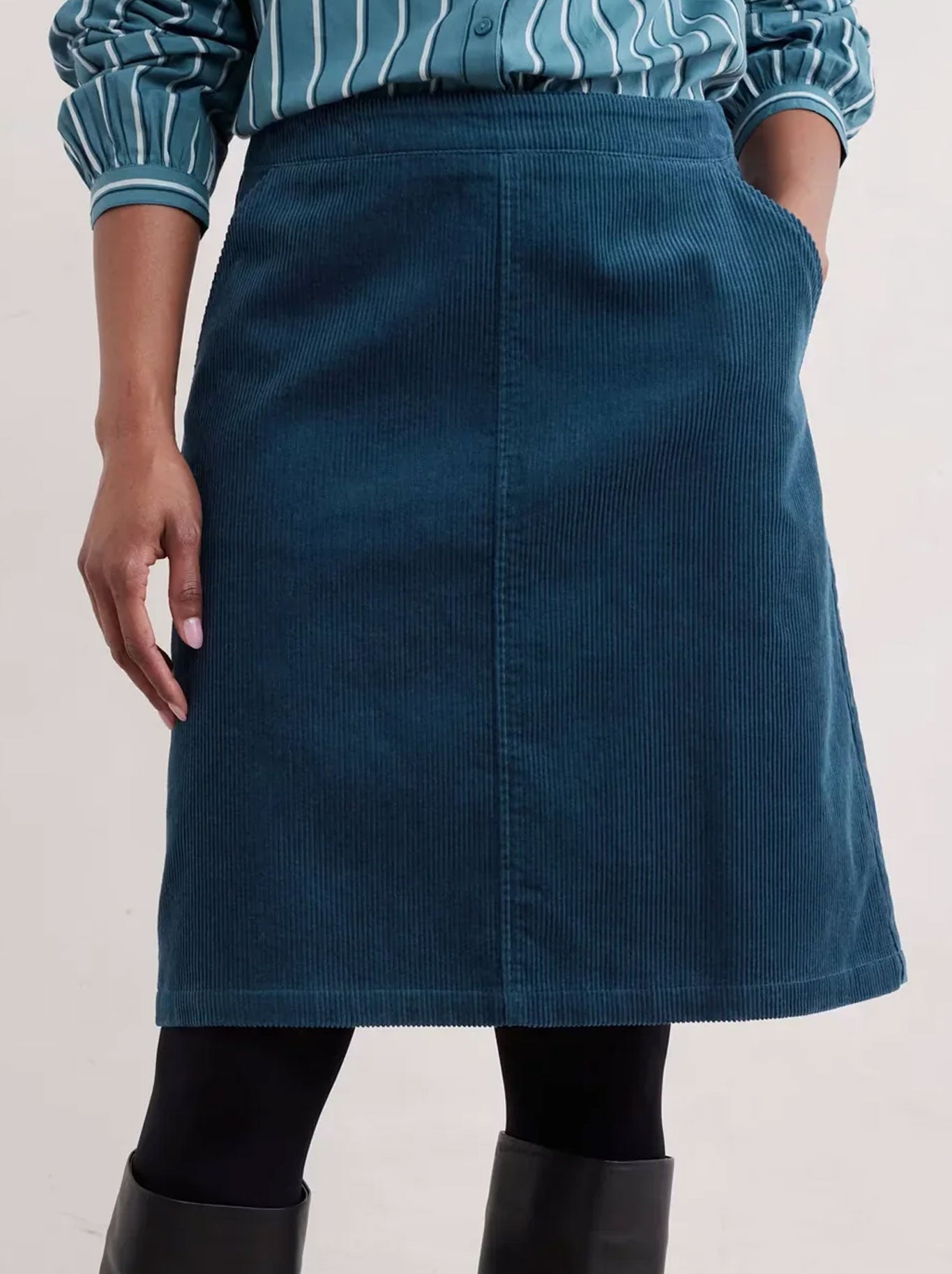 Image of a model wearing Skirts. Product name - Seasalt Dovetail Skirt in Sea Cave colour by brand - Seasalt