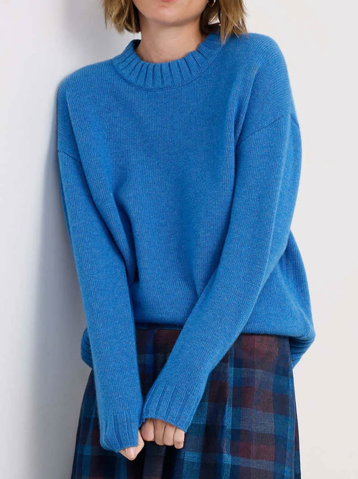 Image of a model wearing Outerwear. Product name - Seasalt Evening Bay Jumper in Jetty colour by brand - Seasalt