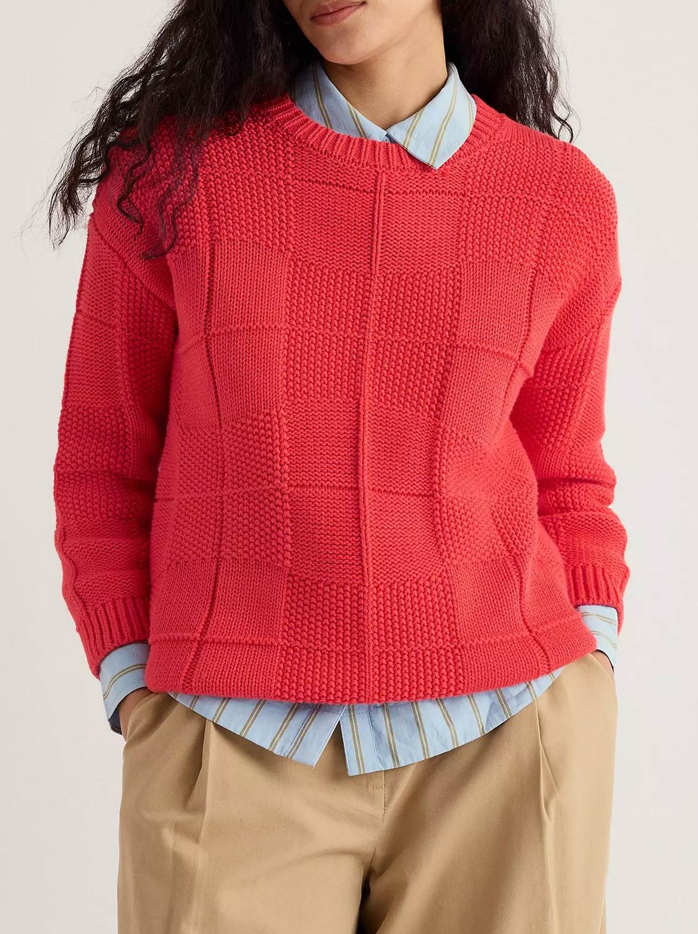 Image of a model wearing Outerwear. Product name - Seasalt Hedge Rock Jumper in Cayenne colour by brand - Seasalt