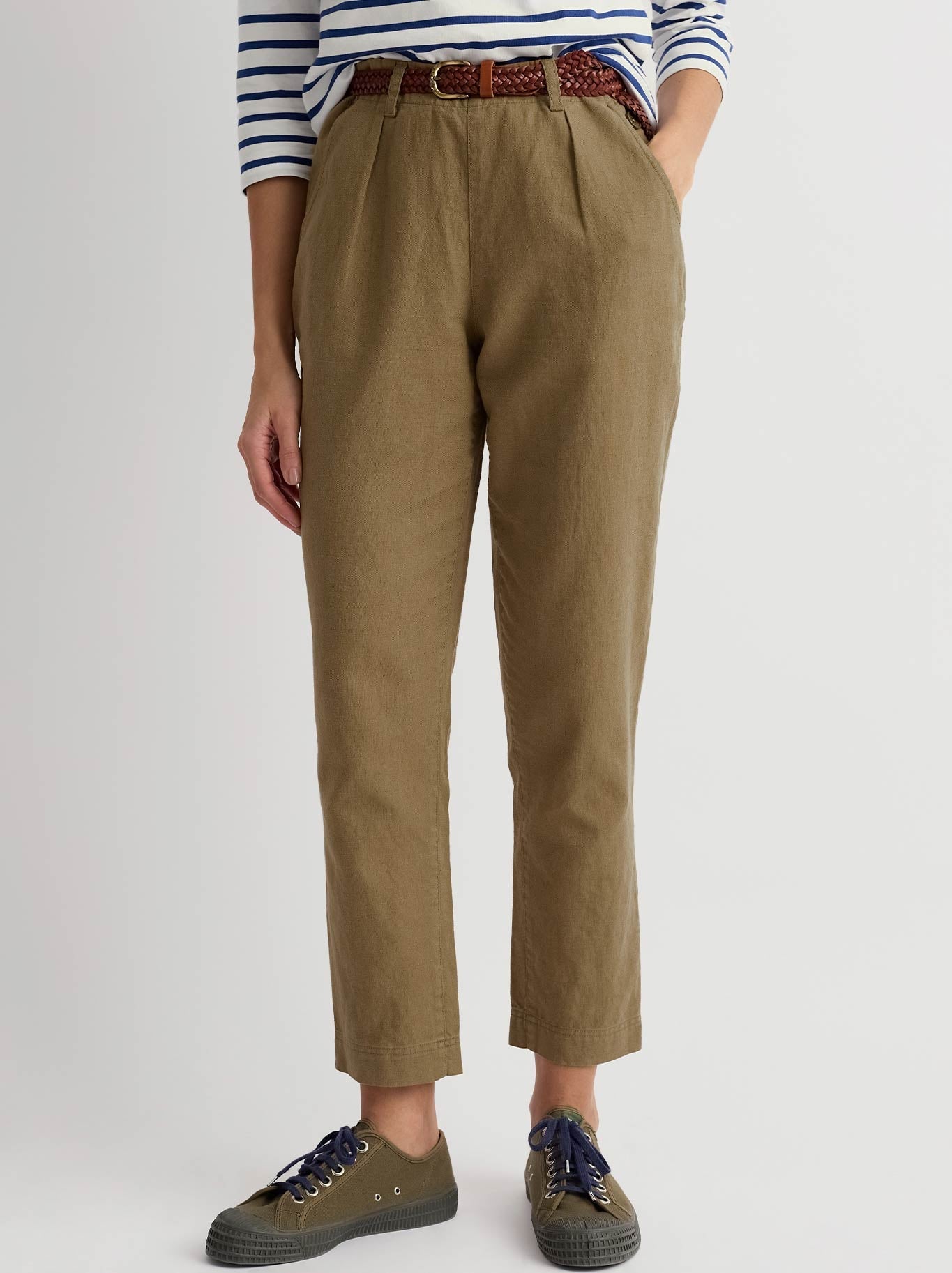 Image of a model wearing Pants. Product name - Seasalt Nanterrow Trouser in Seagrass colour by brand - Seasalt