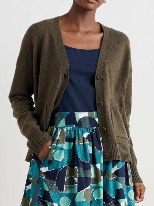 Image of a model wearing Outerwear. Product name - Seasalt Senara Cardigan in Rich Olive colour by brand - Seasalt