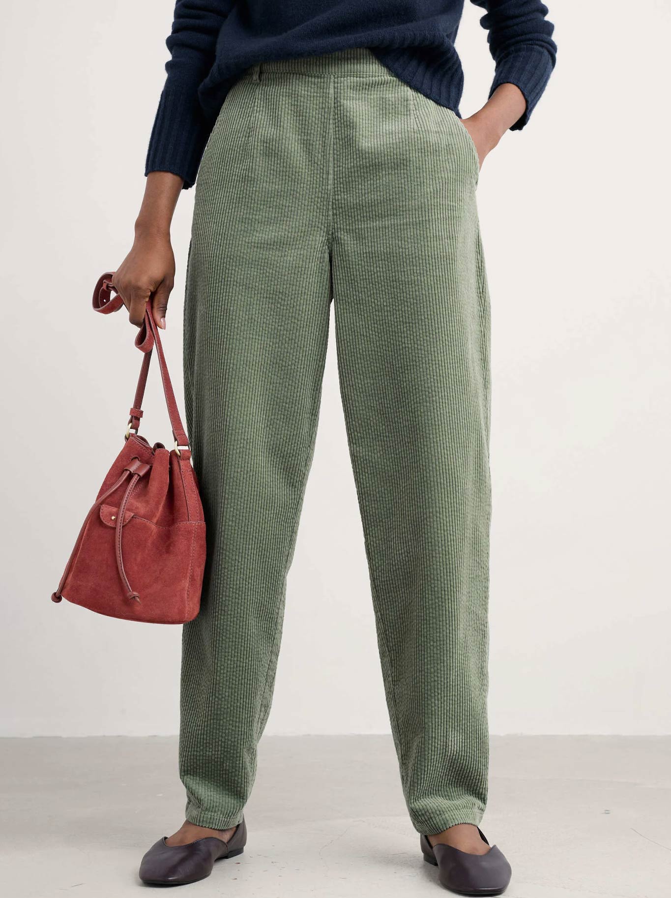 Image of a model wearing Pants. Product name - Seasalt Trethornes Trouser in Dusky Green colour by brand - Seasalt