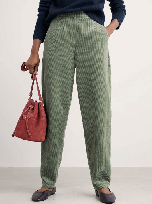 Image of a model wearing Pants. Product name - Seasalt Trethornes Trouser in Dusky Green colour by brand - Seasalt